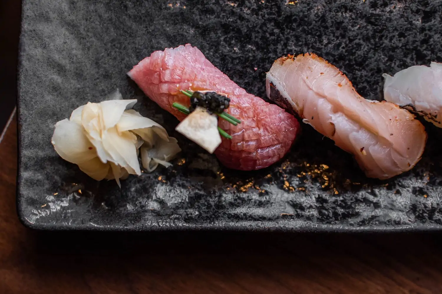 A plate of sushi at Uni, one of the fancy restaurants in Boston. Book on OpenTable.