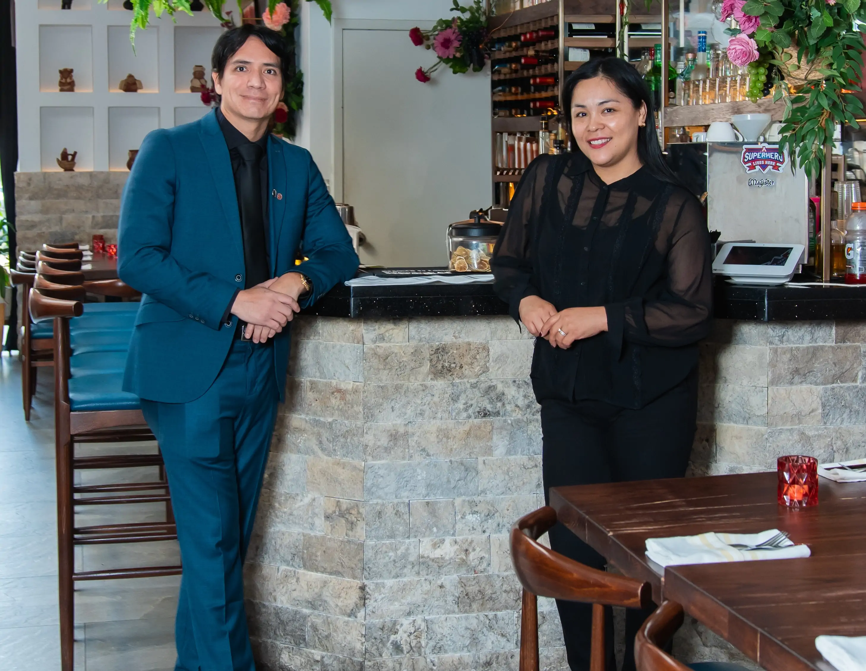 The owners of NYC Peruvian restaurant K’antu, Renzo Chumbiauca and Yasmin Rios, standing side by side