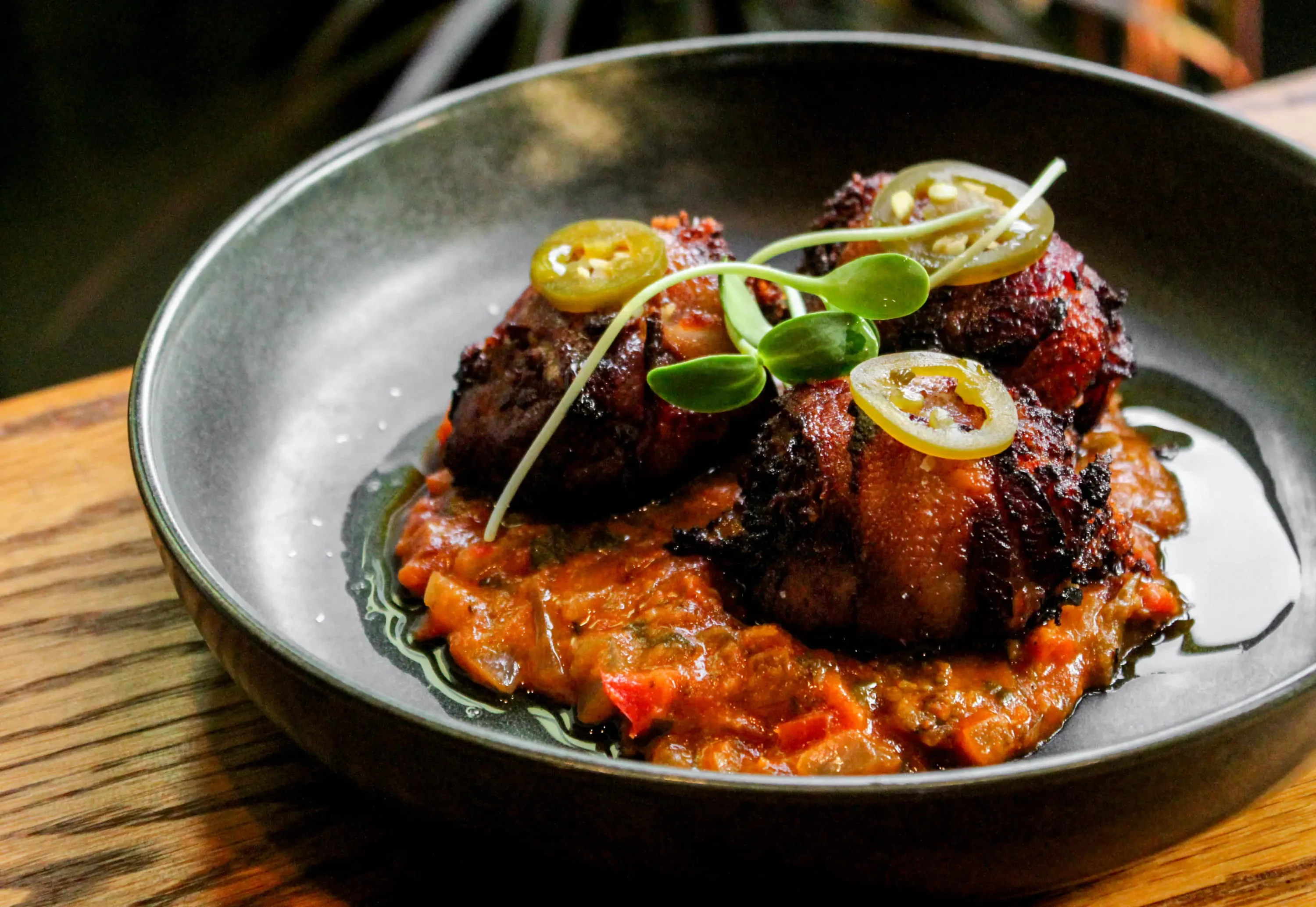 A sweet plantain dish stuffed with chorizo and Oaxacan cheese at Chicago restaurant Amaru