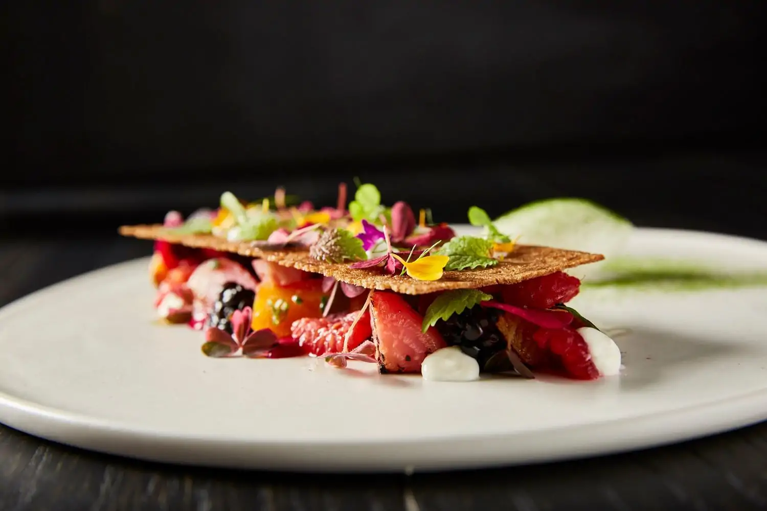 A two layer puff pastry savory dish at Miami restaurant Stubborn Seed