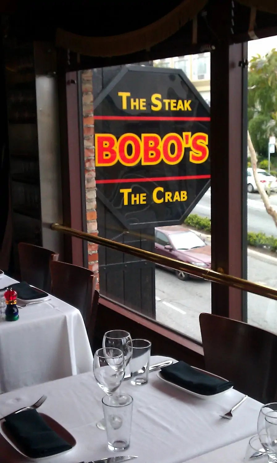 The front sign overlooking Lombard Street at Bobo’s, one of the best steak restaurants in San Francisco on OpenTable.