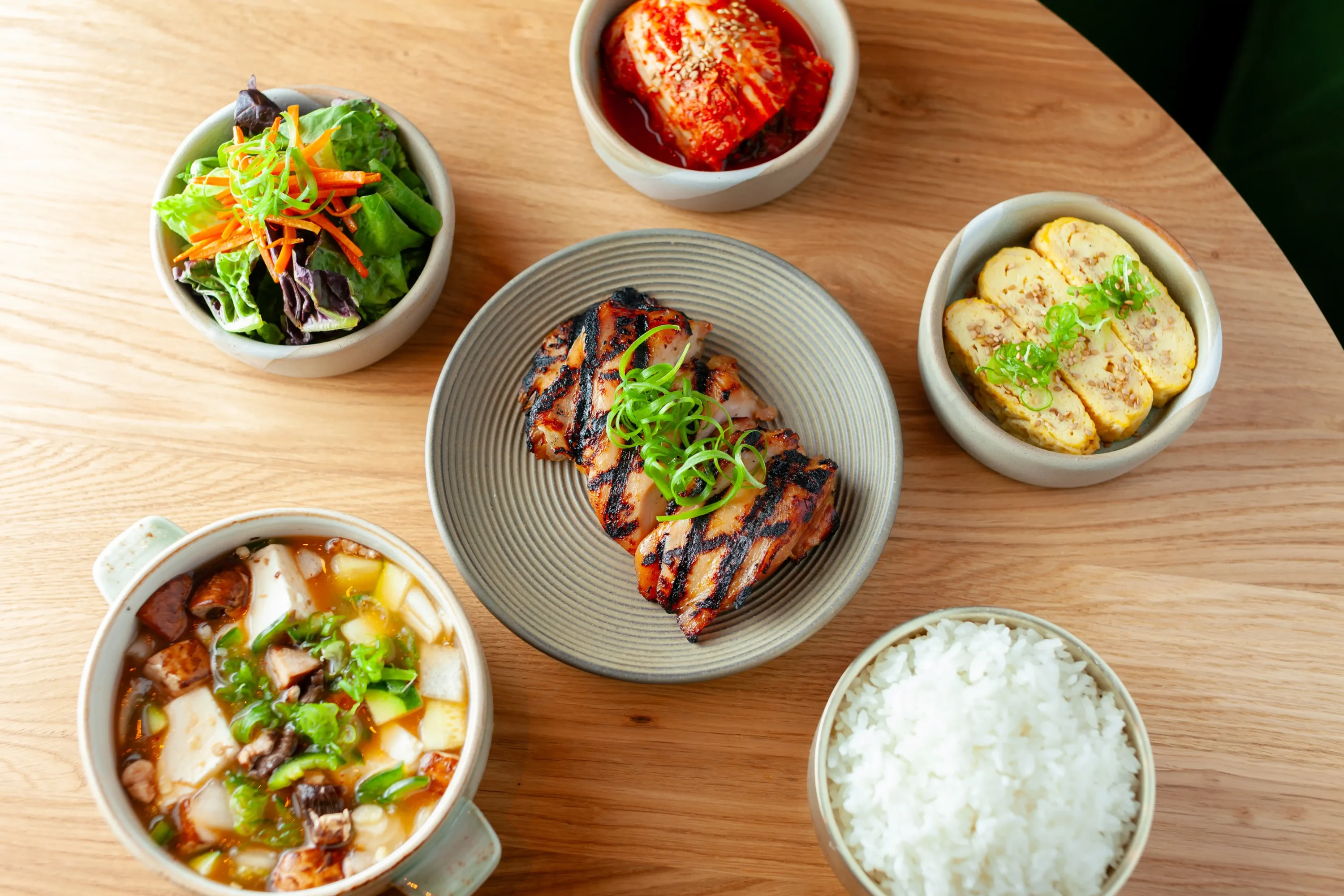 Steaks, classic banchan, and side dishes at PERILLA steakhouse - River Walk in Chicago. Book on OpenTable.