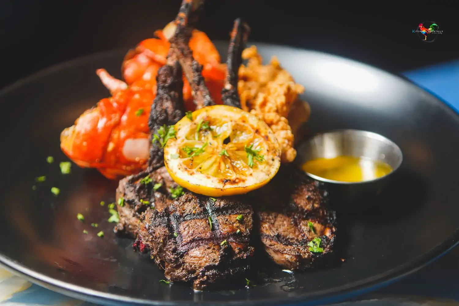 A close-up of the Caribbean Jerk Lamp Chops, a specialty of Kitchen + Kocktails by Kevin Kelley - Dallas, available on OpenTable.