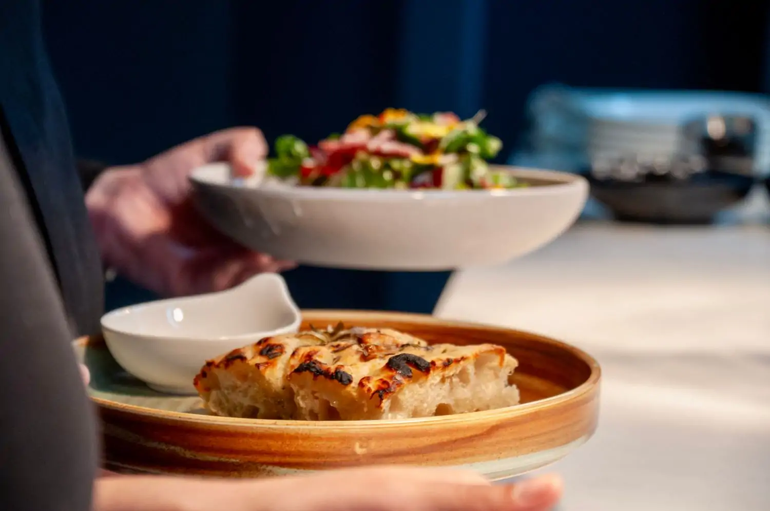 Rosemary and garlic confit focaccia at Radici, one of the best Black-owned restaurants in Dallas available on OpenTable.