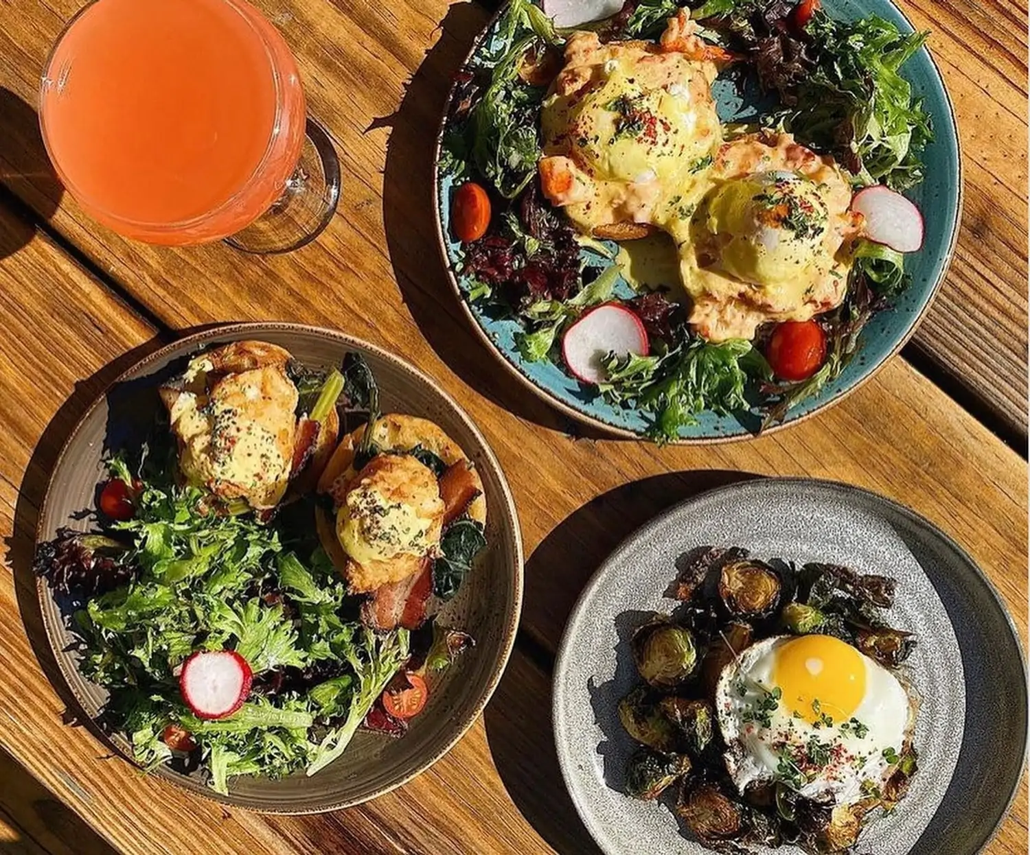 A close-up of three Southern American dishes at Lucille’s, one of the best family restaurants in Houston. Book on OpenTable.