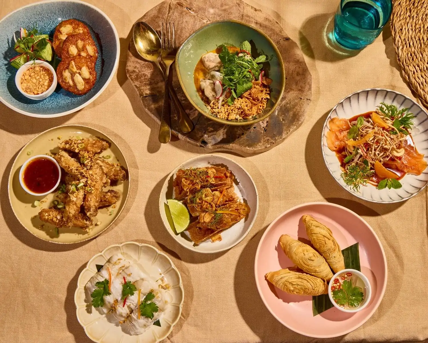 A spread of Southern Thai dishes at Chalong Southern Thai, one of the best Hell’s Kitchen restaurants in NYC on OpenTable.