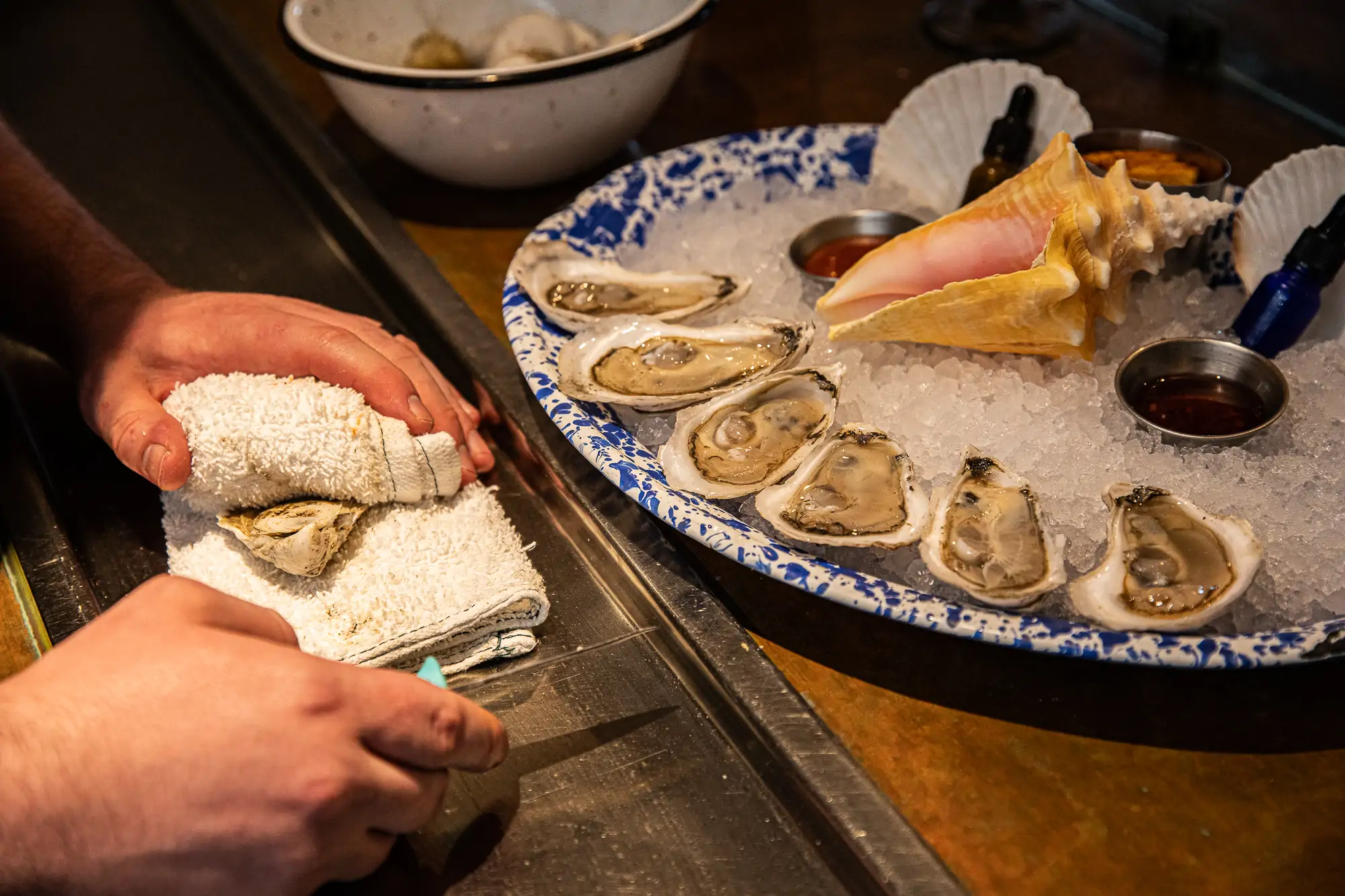 Oysters placed on a counter at Charleston restaurant NICO Oysters + Seafood