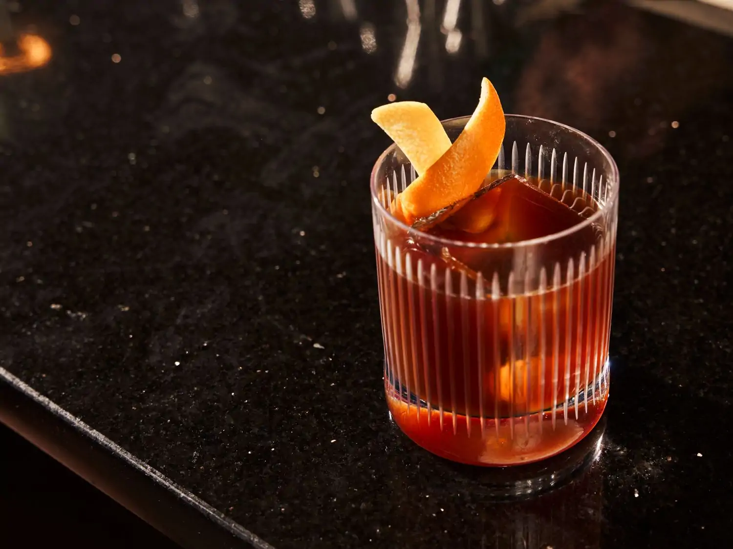 A red cocktail at Philadelphia restaurant Almanac which is among Bon Appétit's Best New Bars for 2025