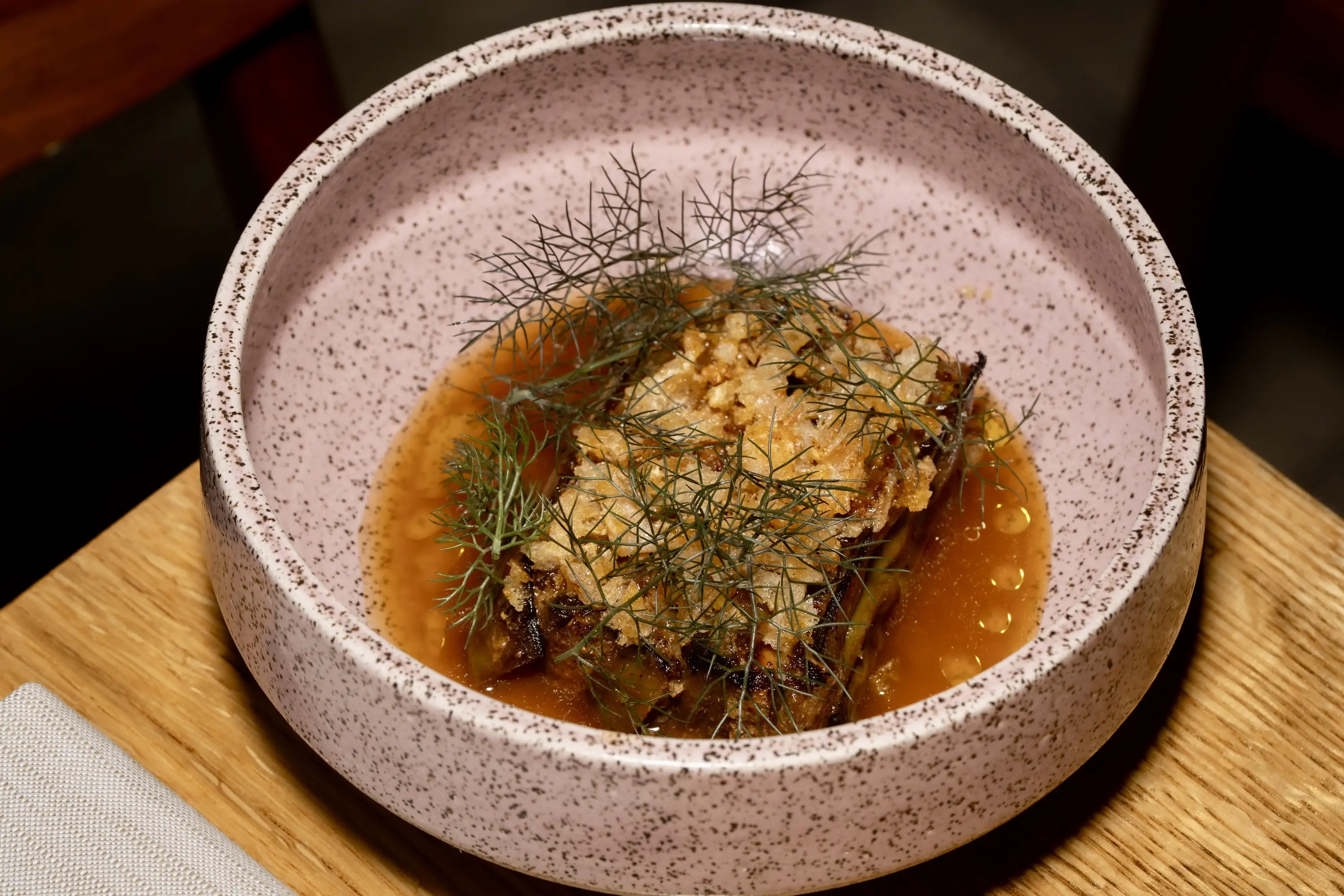 A rabbit lasagna dish in a pink speckled bowl at Philadelphia restaurant Emmett