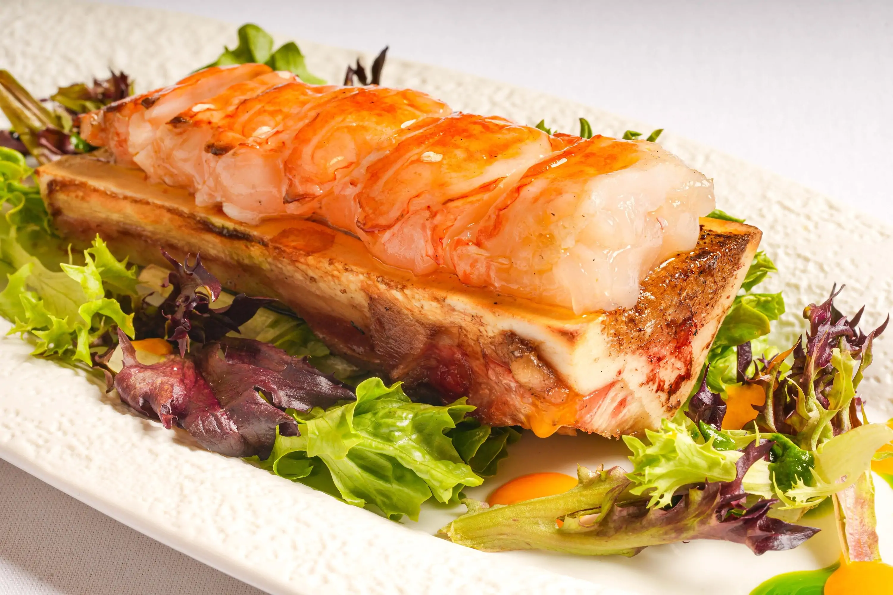 A lobster and bone marrow dish at Miami restaurant Novatore Cucina & Bar