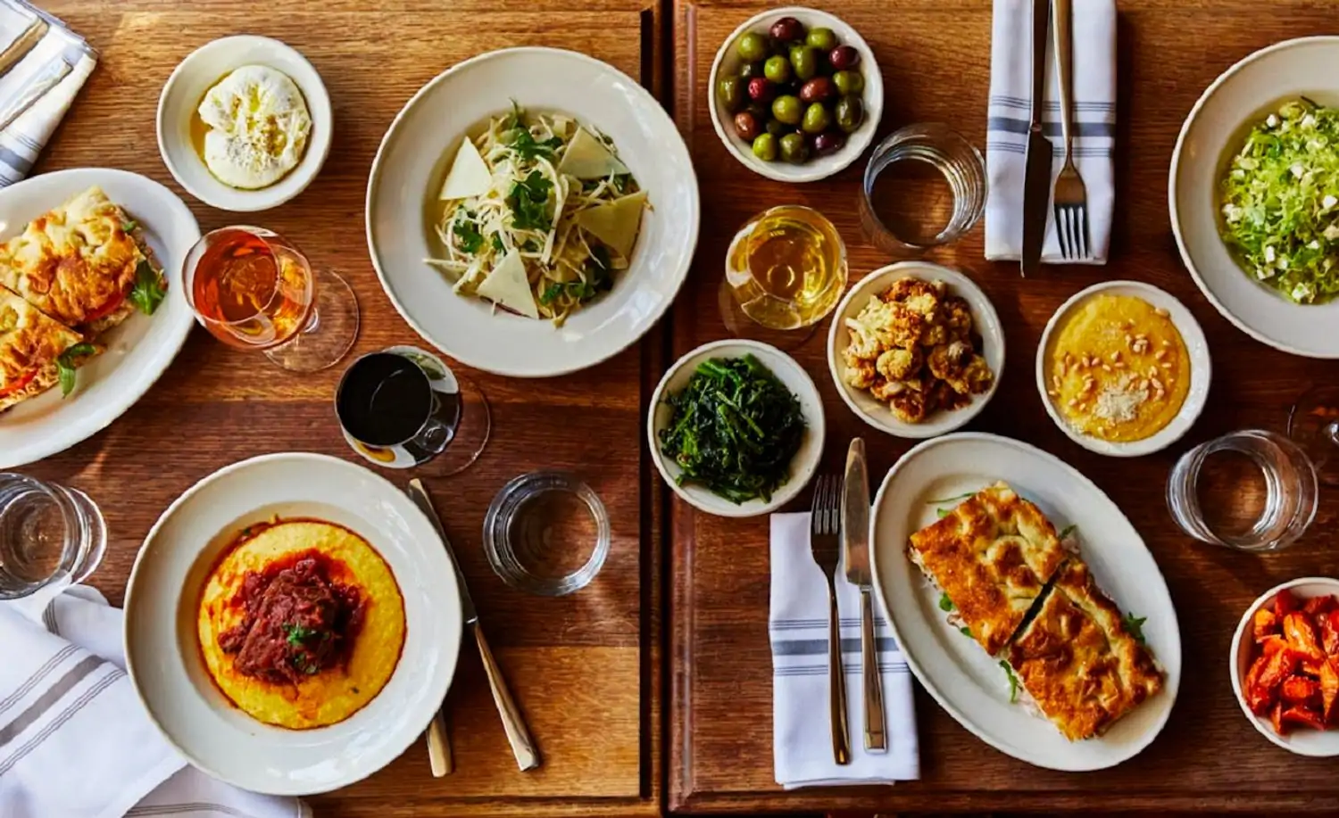 A spread of dishes on a table at NYC restaurant Frankies Spuntino