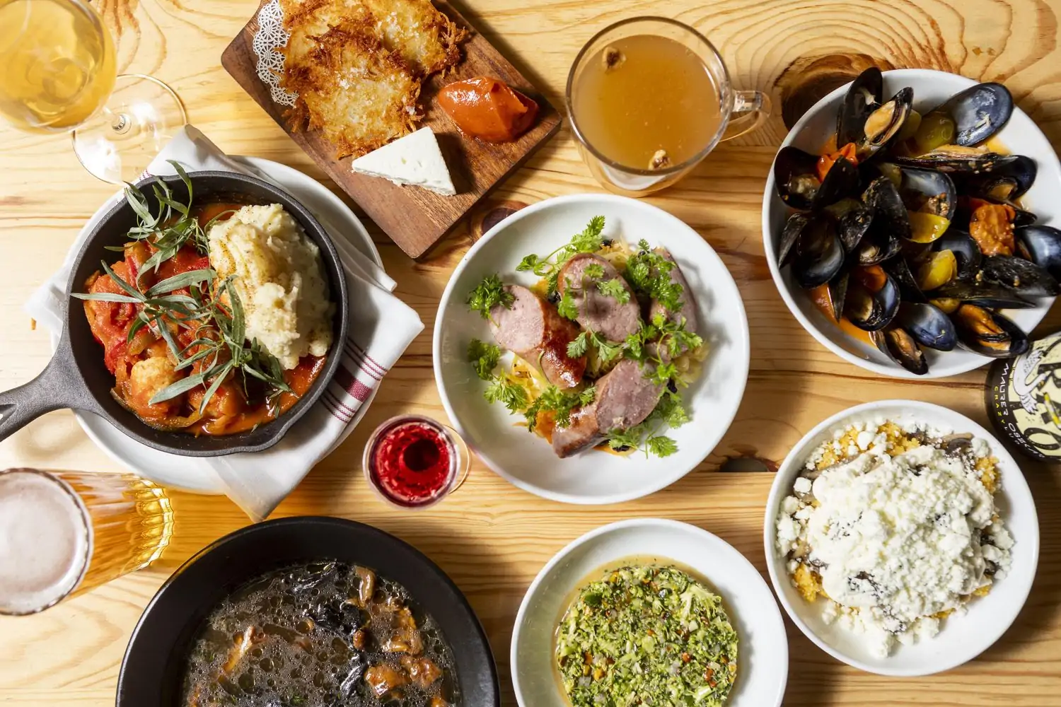 Several Ukrainian dishes on a table at Chicago restaurant Anelya