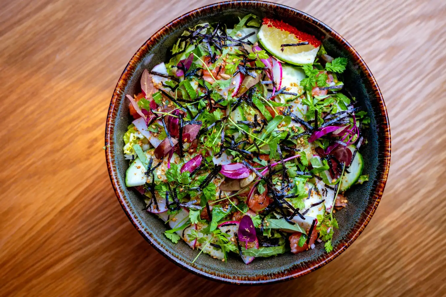 A big fresh salad at PERILLA Steakhouse, one of the best restaurants in Downtown Chicago. Book on OpenTable.
