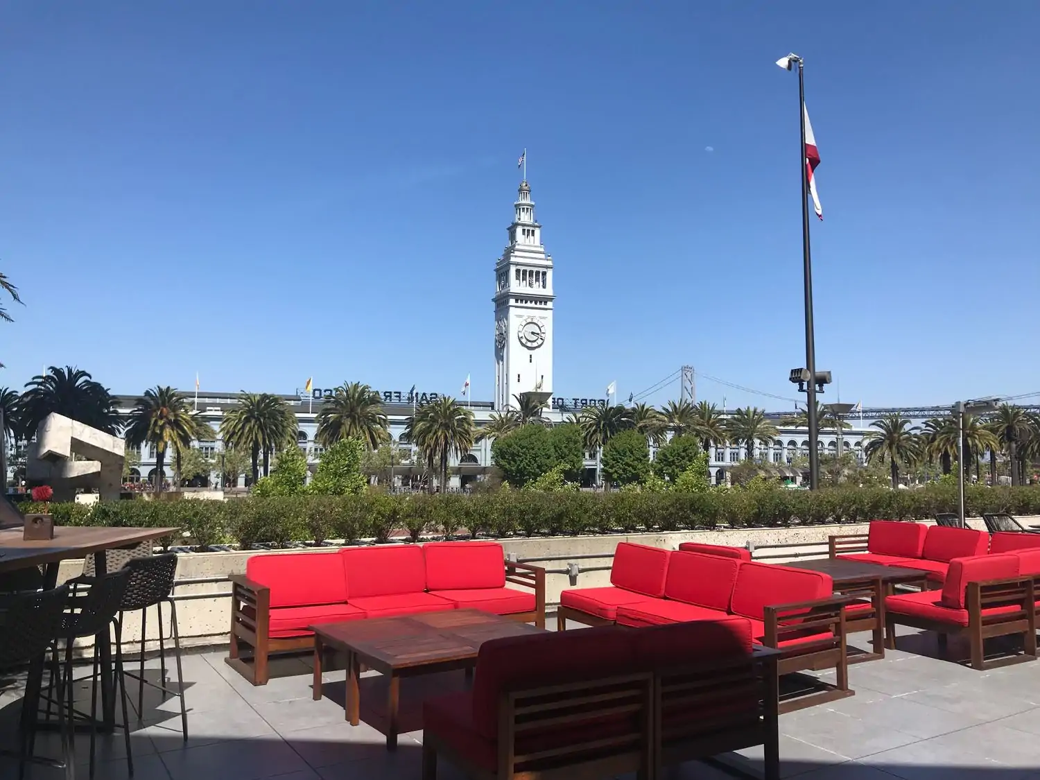 The terrace of San Francisco restaurant Harborview with views of the Ferry Building and the Bay Bridge