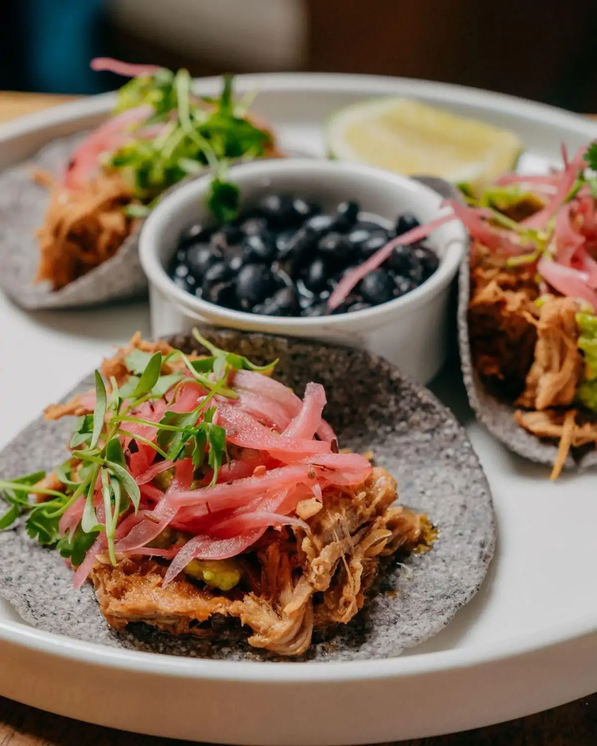 A plate containing several tacos at KOKO, in Coconut Grove, Miami. Reserve on OpenTable.