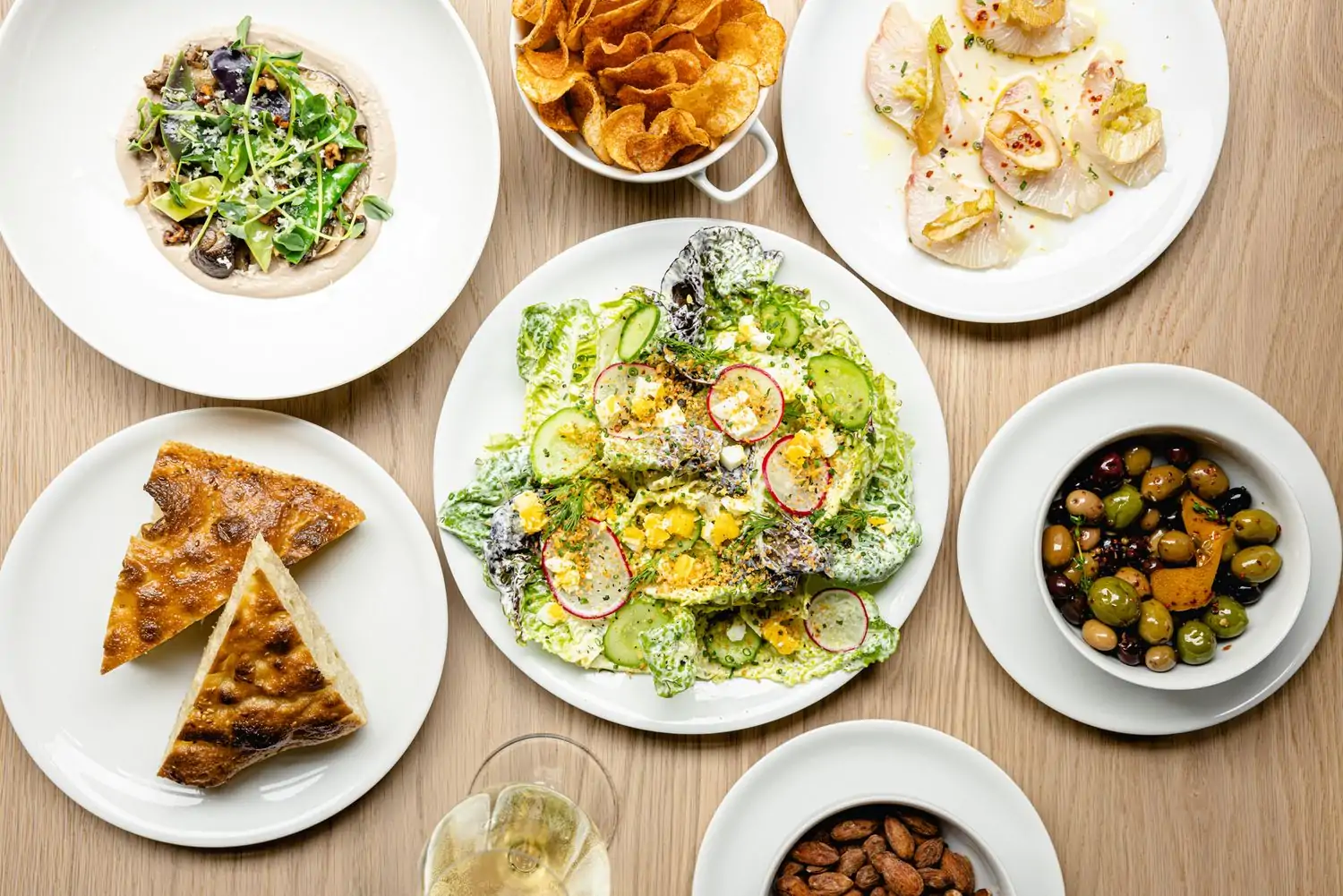 Several dishes on a table at Tribeca restaurant Chambers