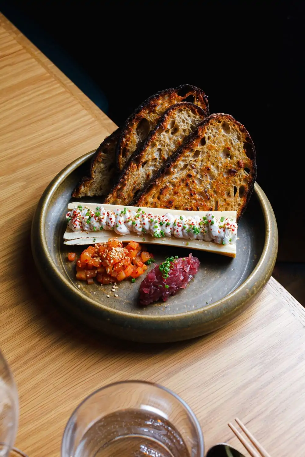 An appetizer plate with grilled bread at PERILLA Steakhouse - Riverwalk, in Chicago, available on OpenTable.