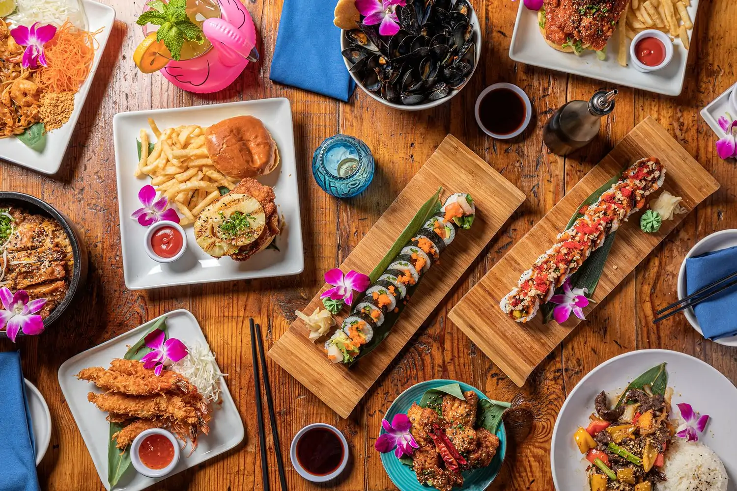 An overhead view of sushi and small plates from BITES Asian Kitchen & Bar in Lakeview, Chicago, available on OpenTable.
