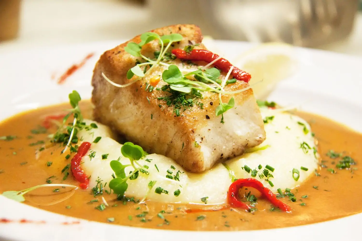 Pan-seared fish over creamy potatoes at L’Ardoise, one of the best restaurants in the Castro District, San Francisco, available on OpenTable.