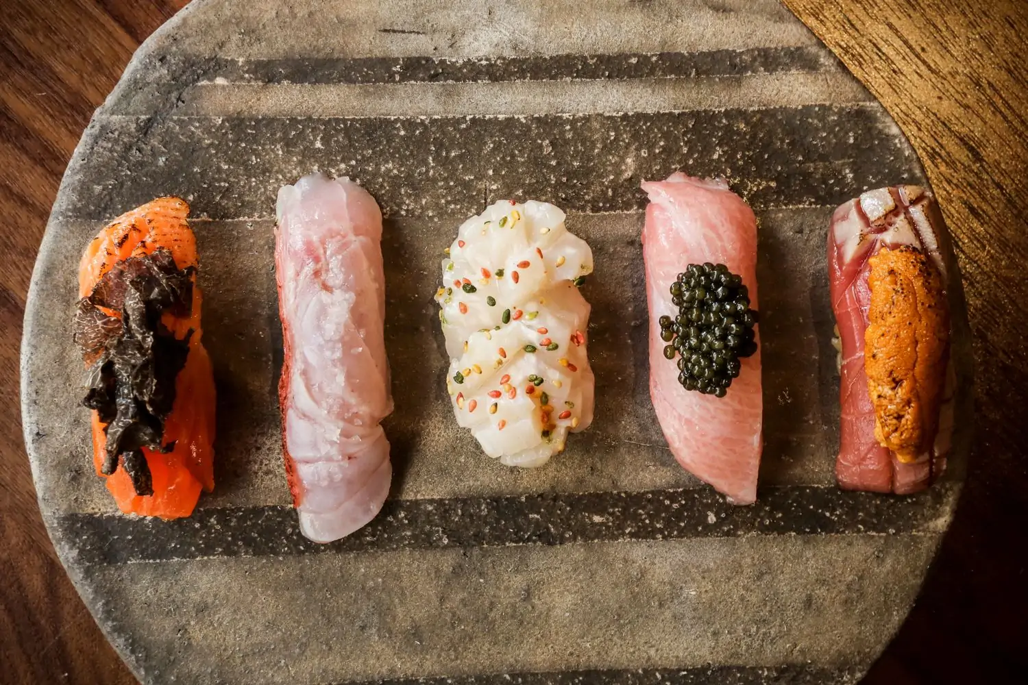 Several pieces of sushi on a plate at San Francisco restaurant AKIKOS