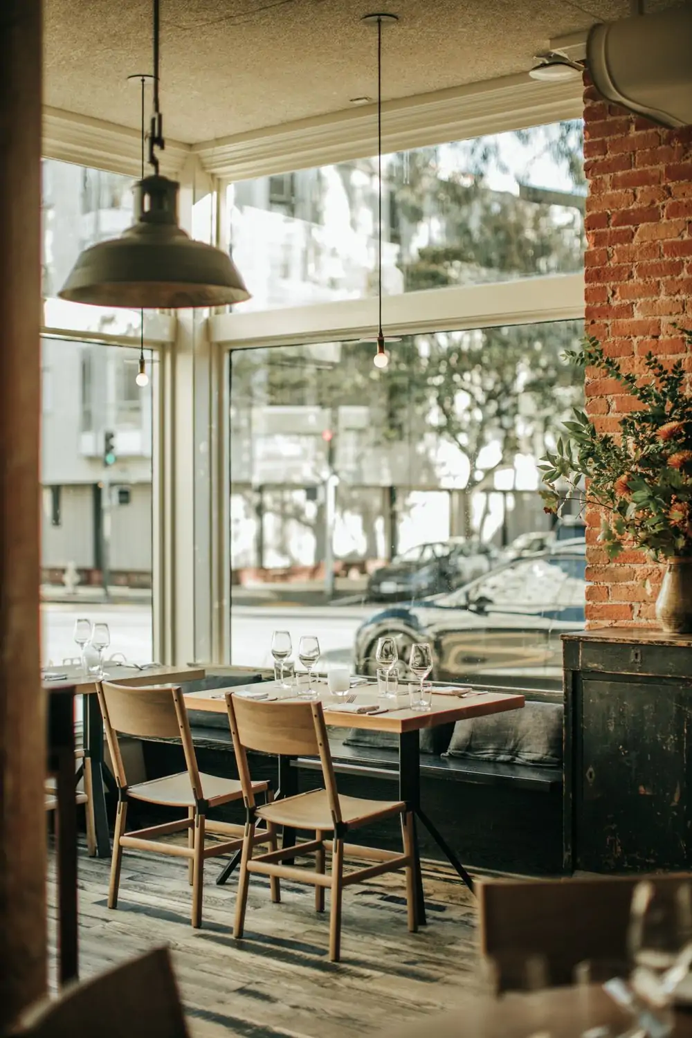 The dining room and large windows at Octavia, one of the best restaurants in Pacific Heights, San Francisco. Secure your spot on OpenTable.