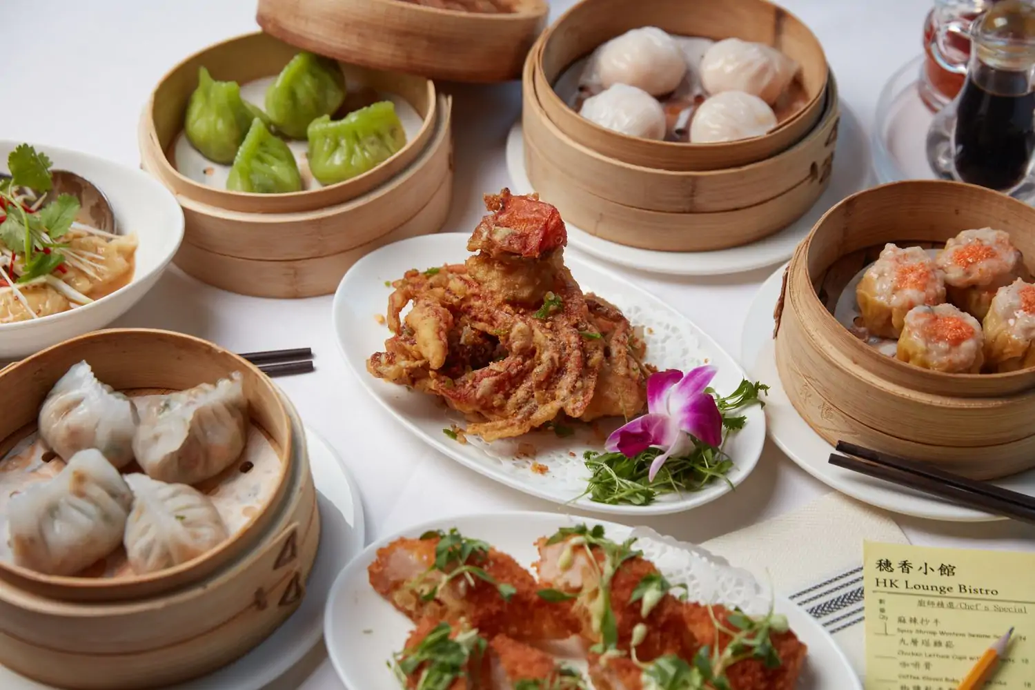 Several dim sum on a table at San Francisco restaurant HK Lounge Bistro