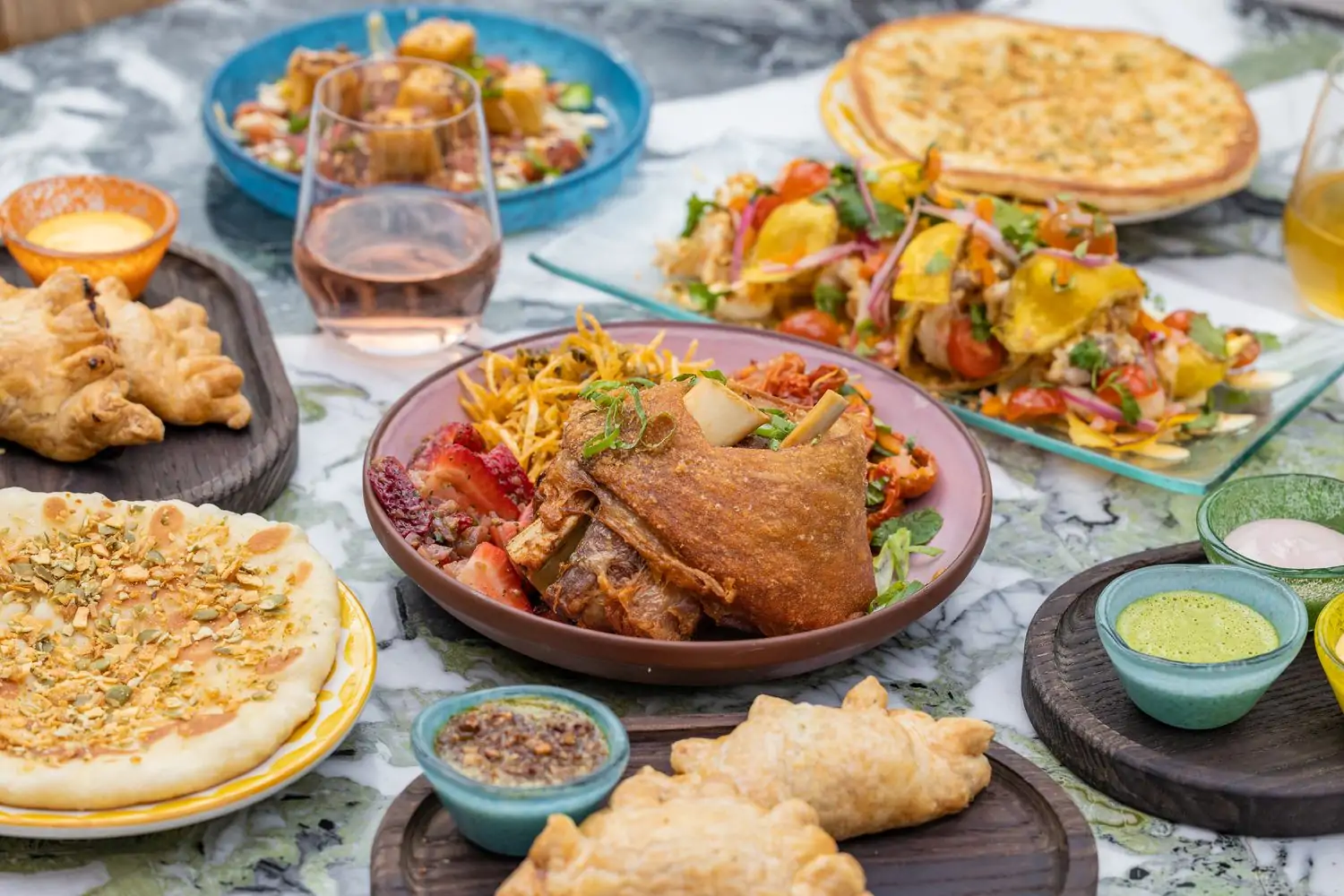 Peruvian dishes on a table at Cabra - LA, one of the best restaurants with a view in Los Angeles, on OpenTable.